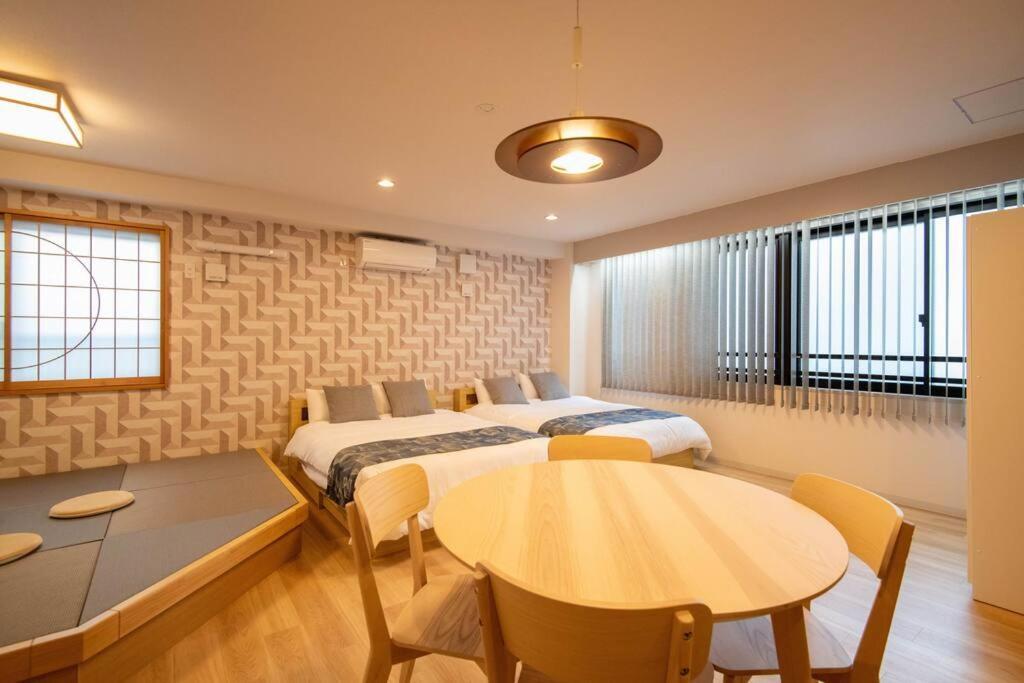 Appartement 浅草禅心居202室 浅草駅徒歩15分 2024年4月ニューオープン 43平米丸貸し切り ダブルベット2台と畳敷き布団2組 家庭式用品設備完備