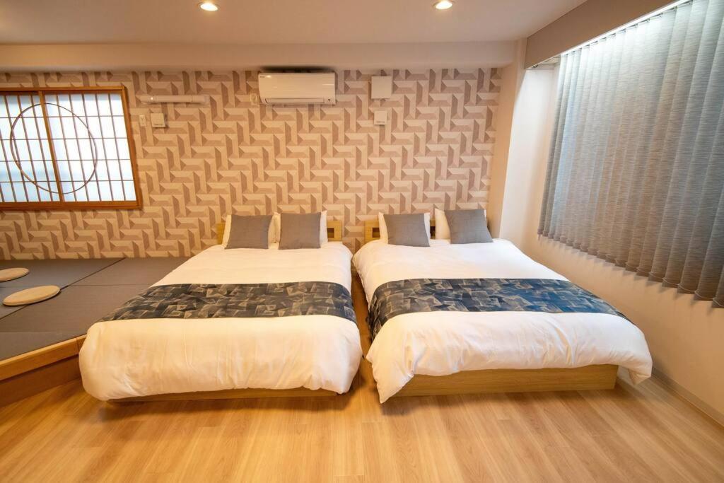 Apartemen 浅草禅心居202室 浅草駅徒歩15分 2024年4月ニューオープン 43平米丸貸し切り ダブルベット2台と畳敷き布団2組 家庭式用品設備完備 Tokyo