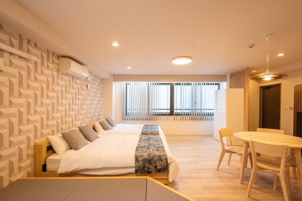 Appartement 浅草禅心居202室 浅草駅徒歩15分 2024年4月ニューオープン 43平米丸貸し切り ダブルベット2台と畳敷き布団2組 家庭式用品設備完備 *