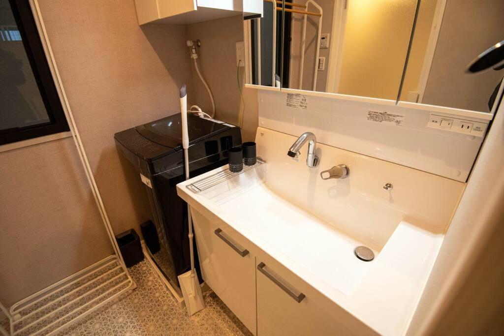 Appartement 浅草禅心居202室 浅草駅徒歩15分 2024年4月ニューオープン 43平米丸貸し切り ダブルベット2台と畳敷き布団2組 家庭式用品設備完備 Tōkyō